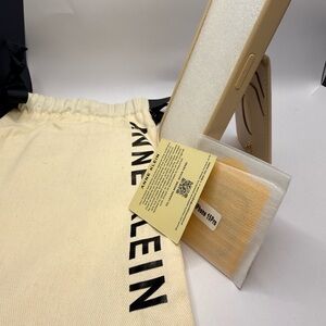 Anne Klein iPhone 15 Pro Wallet Case Beige Card Holder Strap